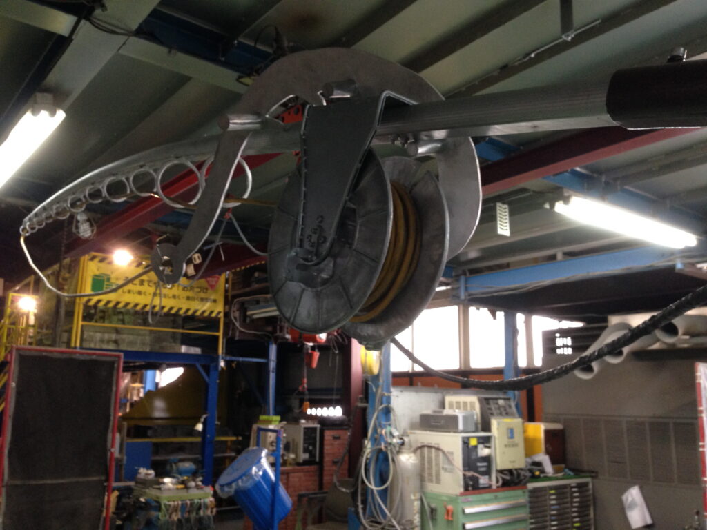 釣竿風延長コード巻き